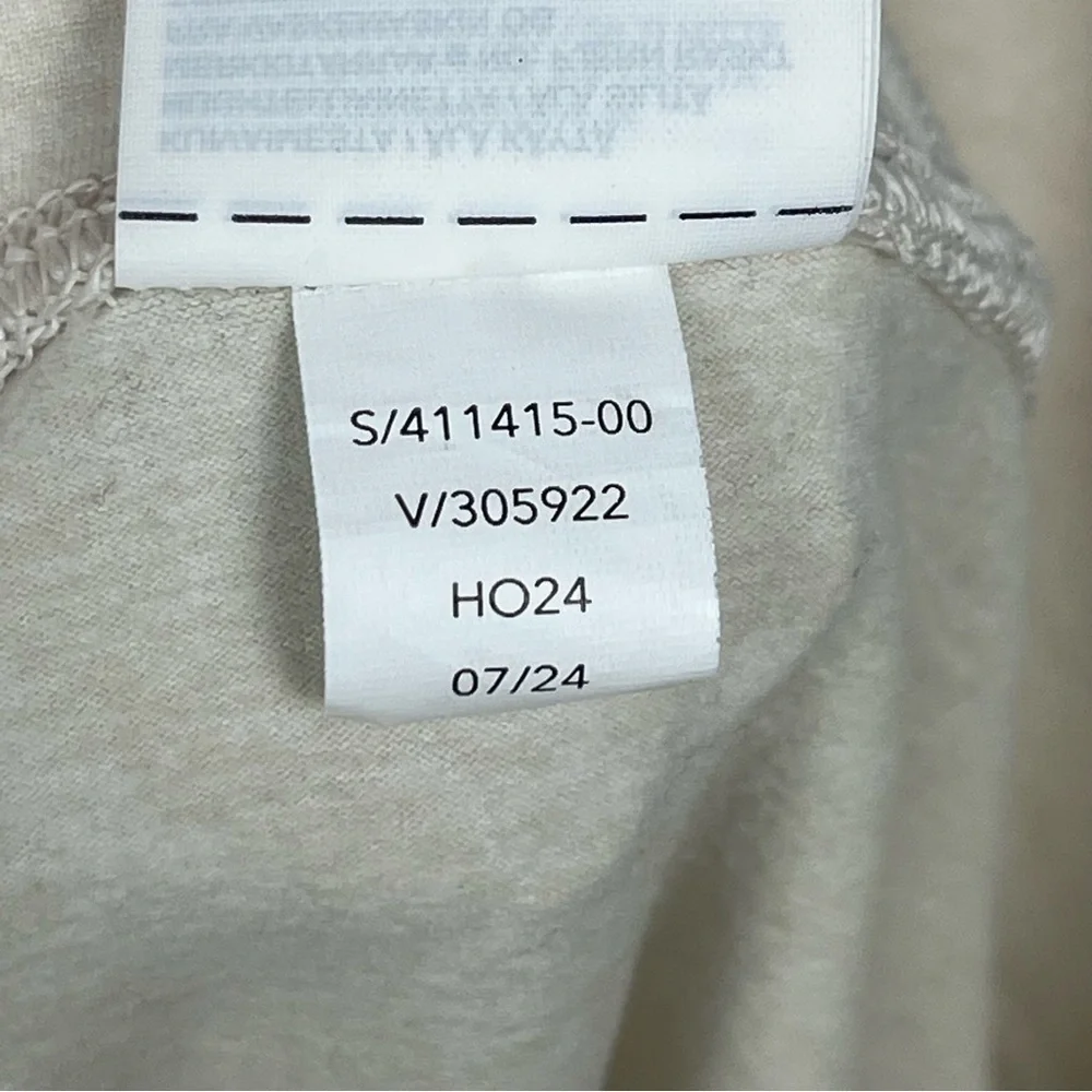 Athleta ivory oatmeal color Softluxe Cuffed Tight, size small.